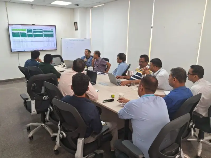Client team reviewing a compliance dashboard during an audit meeting